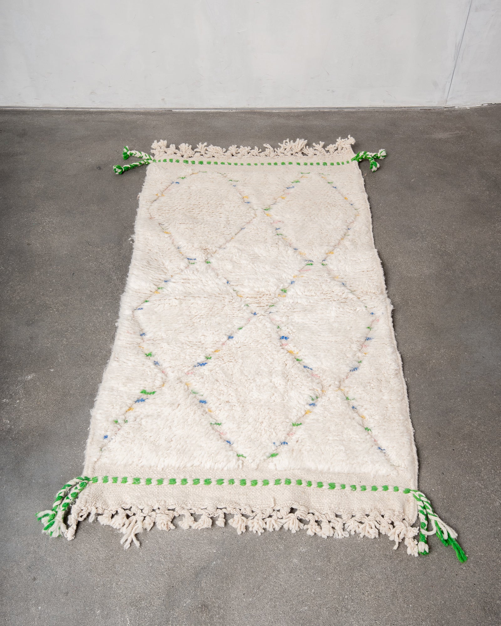 Modern, designer, handcrafted Berber rug from Morocco. Beniourain carpet with beautiful colours and patterns and fluffy wool texture.